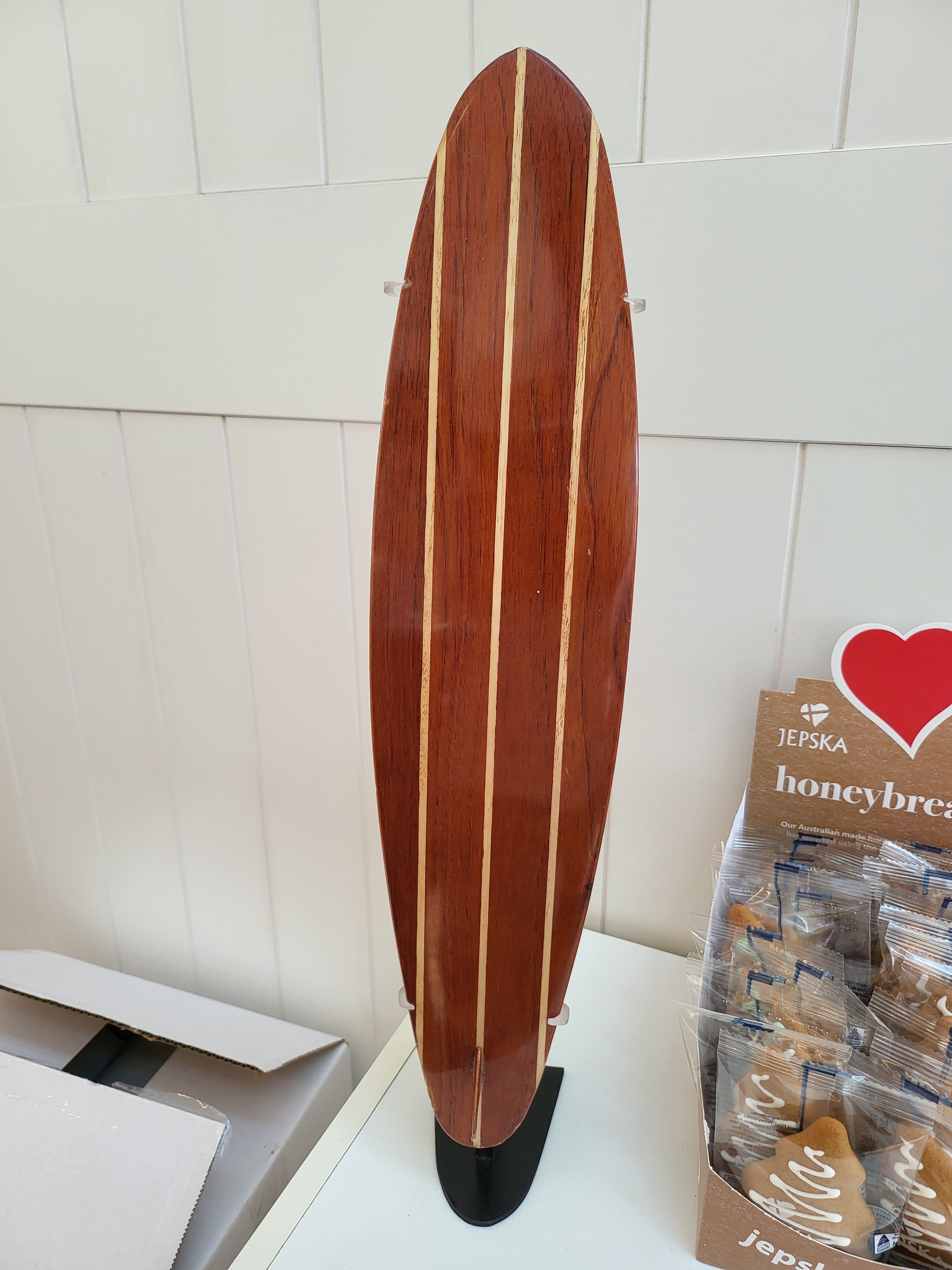 500mm mini longboards - surfboards on a stand