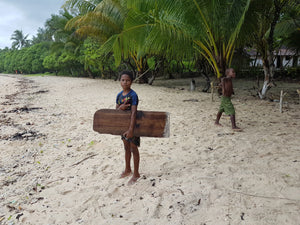 Travel to Papua New Guinea and build a balsa board