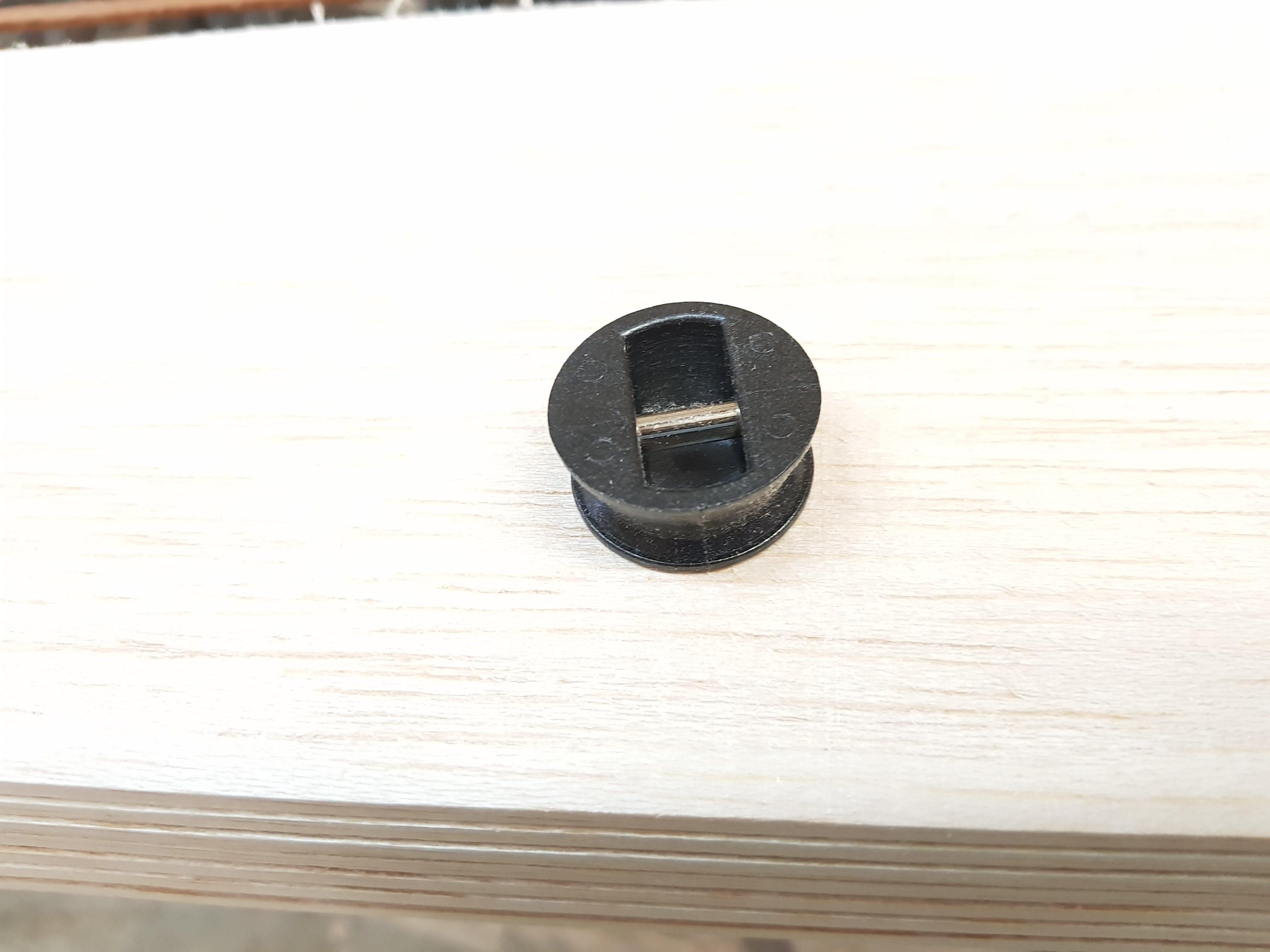 Legrope or leash plug in black or white or wood colour