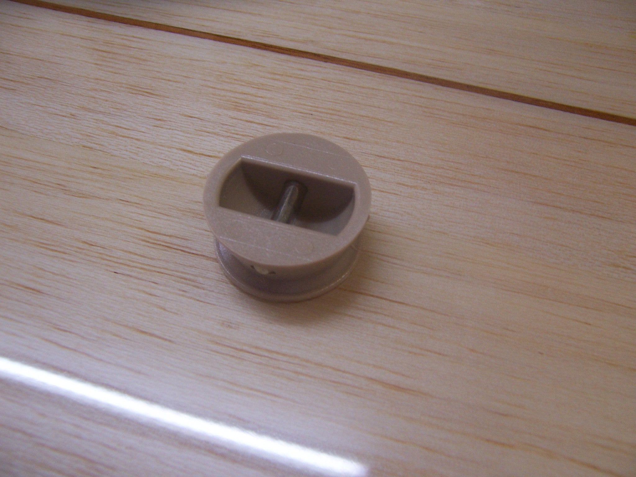 Legrope or leash plug in black or white or wood colour